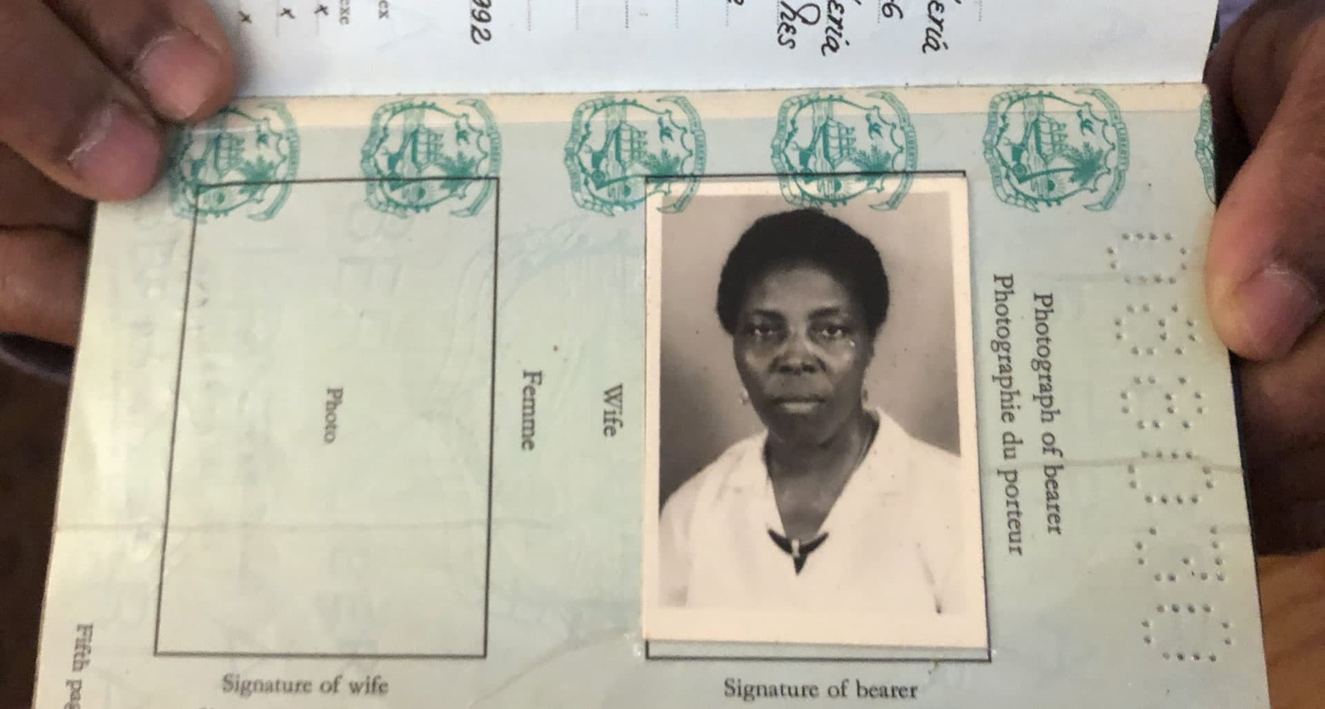 Nora Ketter's Liberian passport. She came to the U.S. in 1989 on a visitor visa. (Lynn Jolicoeur/WBUR)