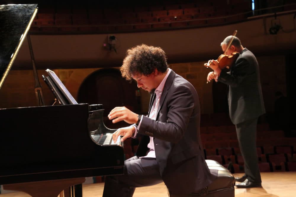 Ilmar Gavilán (playing the violin) and Aldo López-Gavilán. (Courtesy)