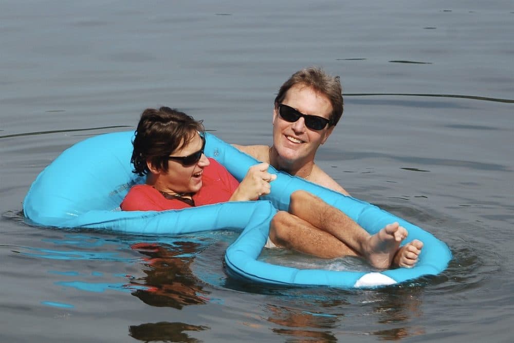 Steven Gardner swimming with Graham. (Courtesy of Stephen Gardner Photography)