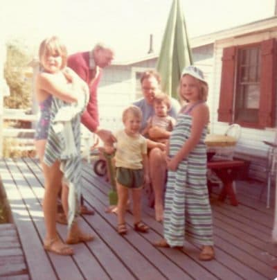 The author (left) with her grandfather, father and siblings on the back porch of the bungalow, in the late 1970s.