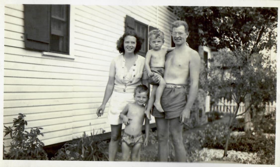 The author’s grandmother, grandfather, father and uncle by the Breezy Point bungalow in 1944.