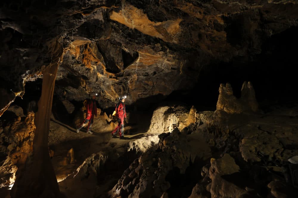 Exploring the cave. (Deep Time © Human Adaptation Institute)