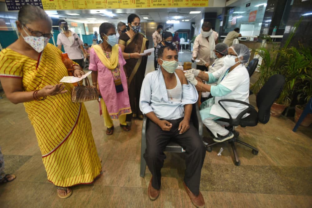 A man being vaccinated against COVID-19, at a district hospital in Noida, India. (Sunil Ghosh/Hindustan Times via Getty Images)