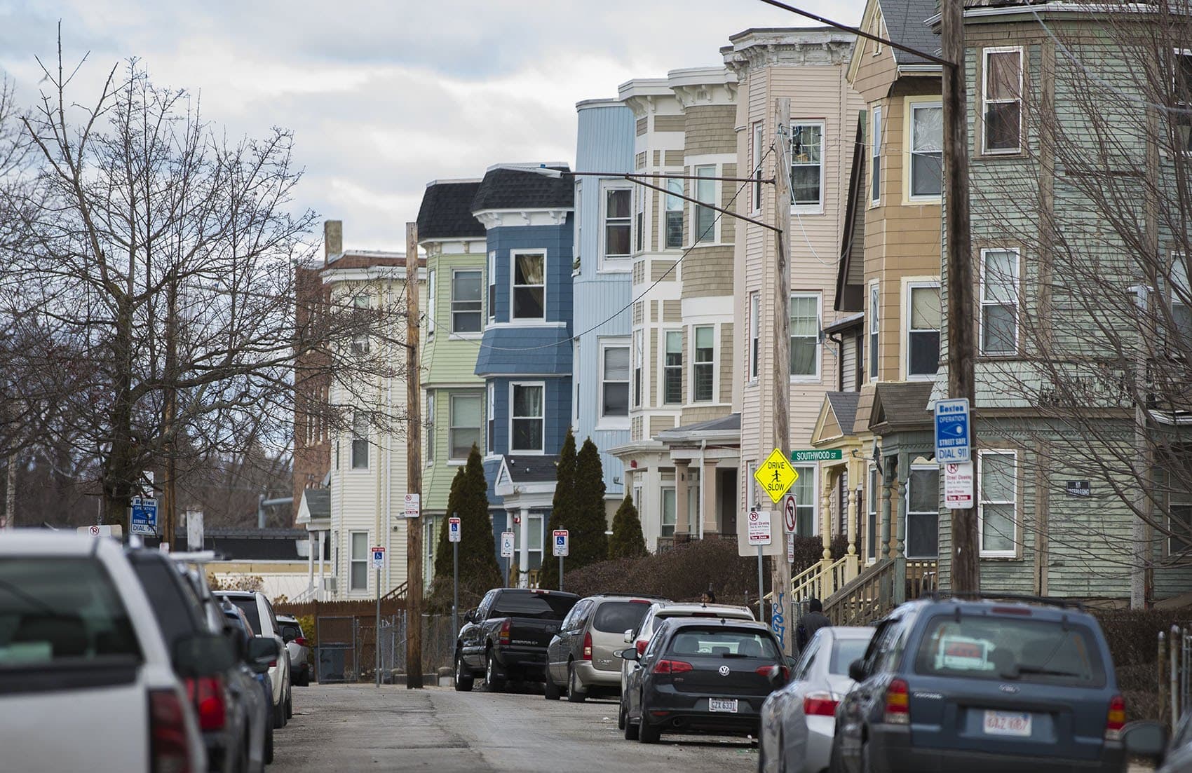Triple-deckers along Edgewood Street in Boston. (Jesse Costa/WBUR)