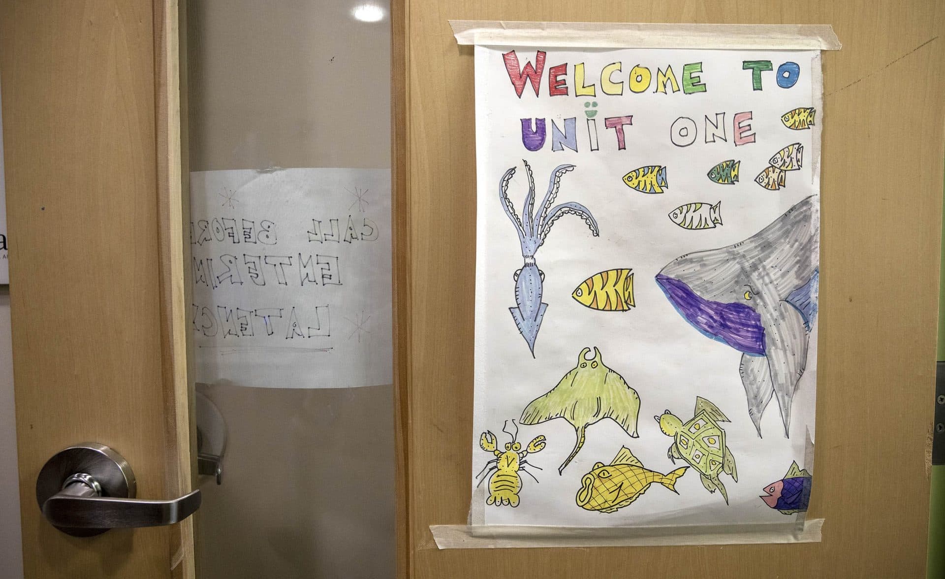 A welcome poster on the door of an inpatient psychiatric unit Franciscan Children's Hospital in Brighton. (Robin Lubbock/WBUR)