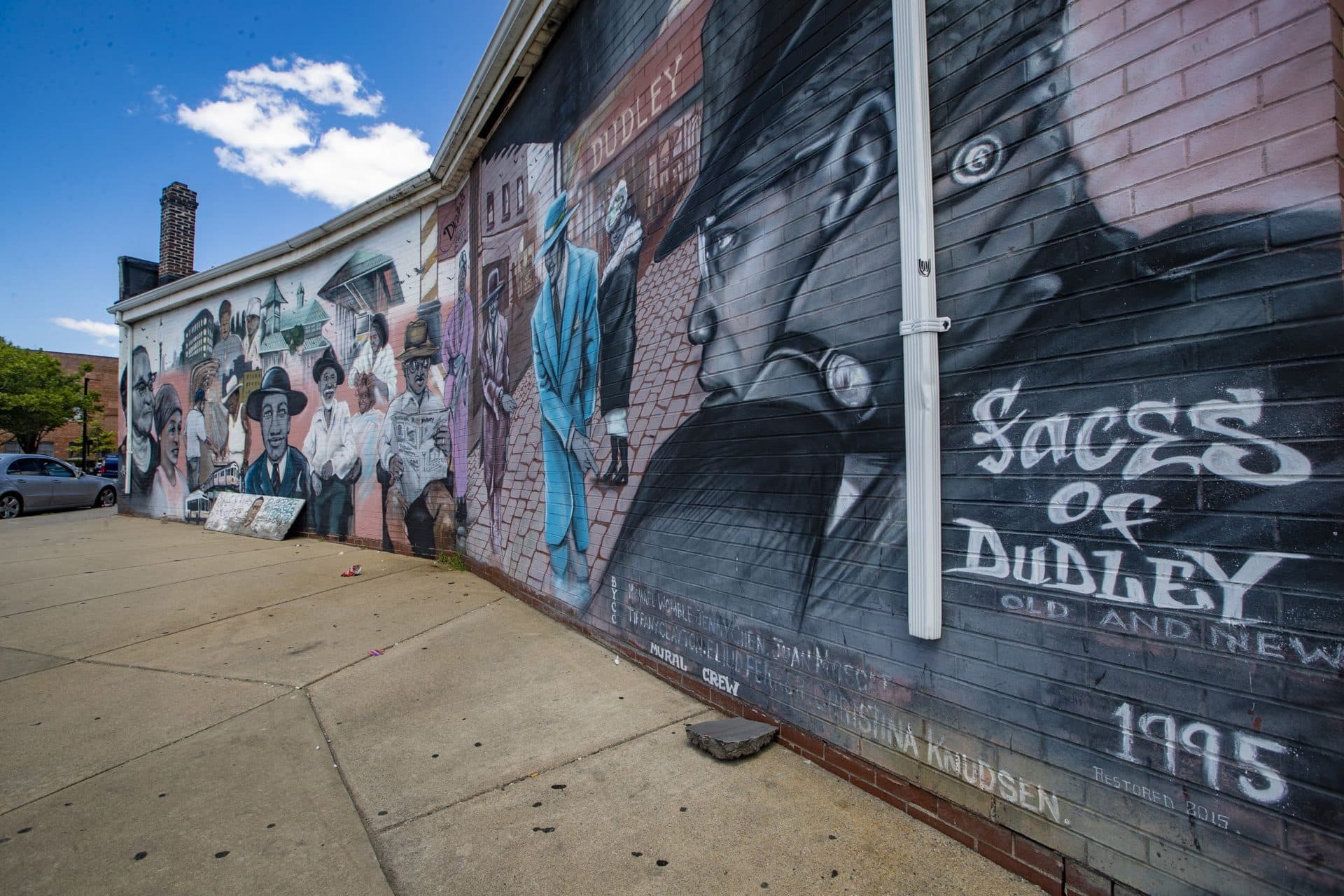 ‘The Faces of Dudley’ mural in Nubian Square. (Jesse Costa/WBUR)