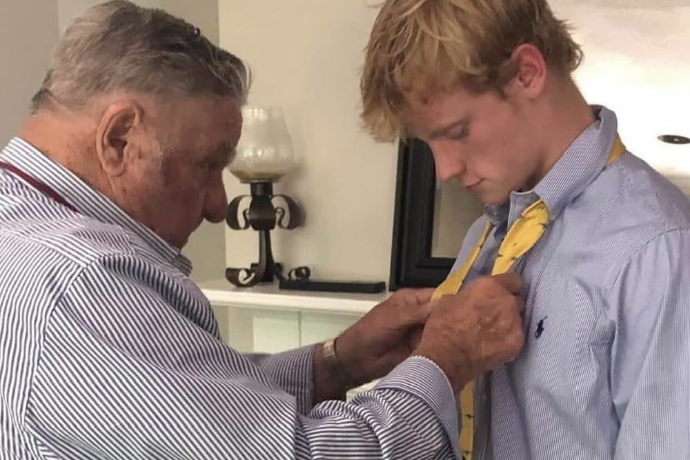 Jackson's grandfather, Mario Marmai, fixes Jackson's tie before high school graduation in 2019. (Courtesy Karen Marmai)
