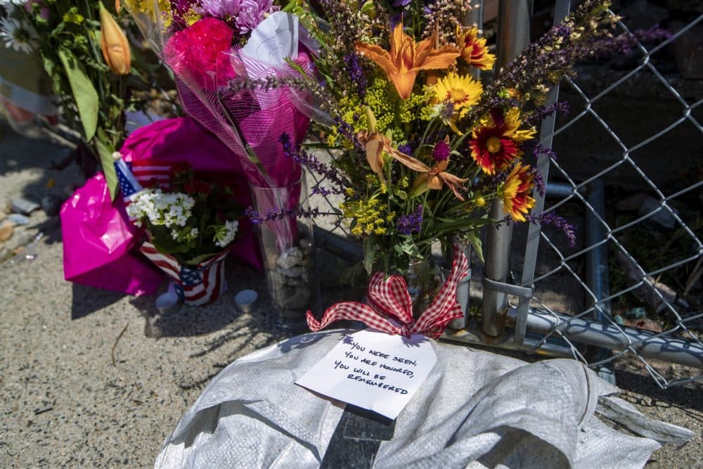 Remembrances were left near the scene in Winthrop. (Jesse Costa/WBUR)