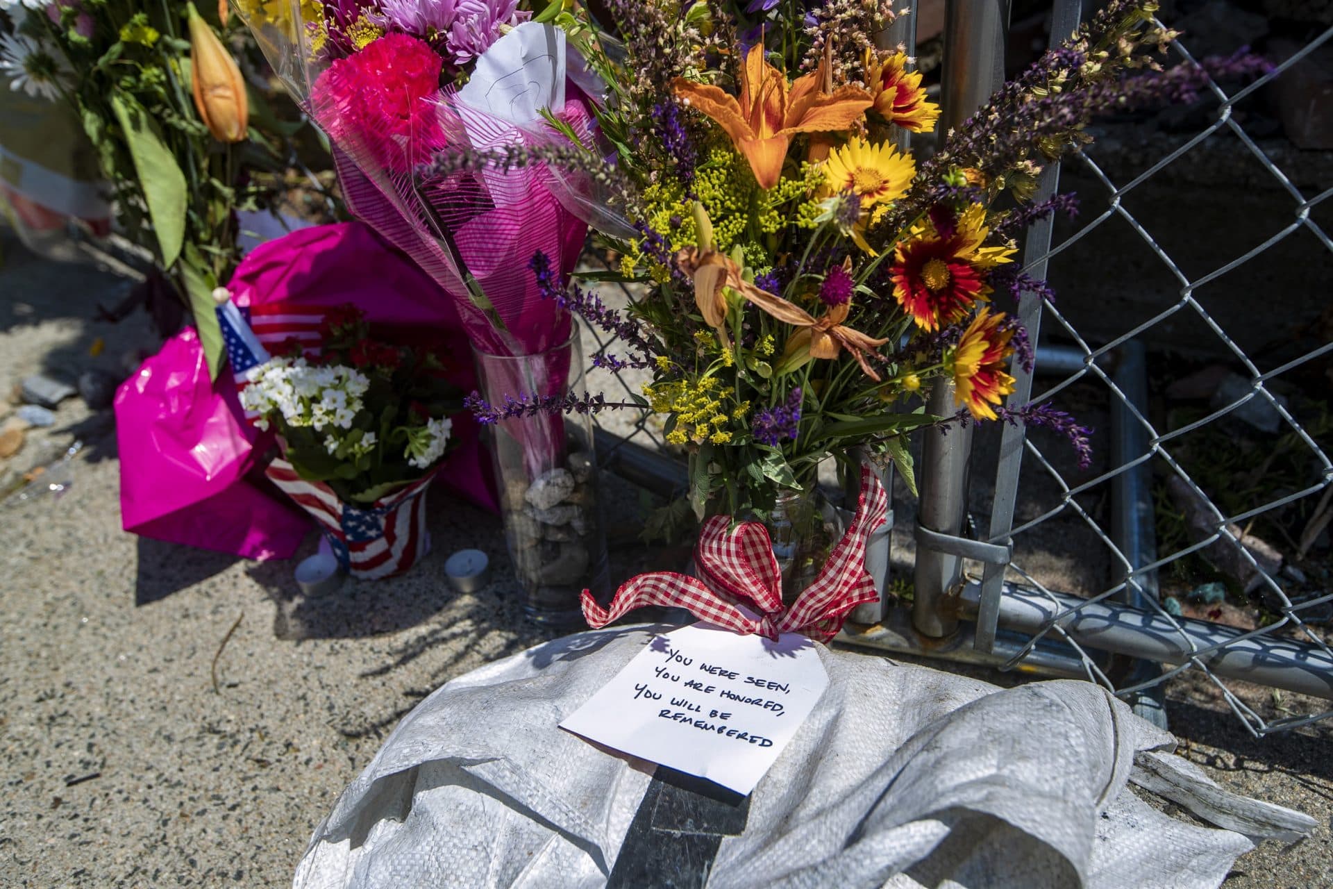 Remembrances were left near the scene in Winthrop. (Jesse Costa/WBUR)