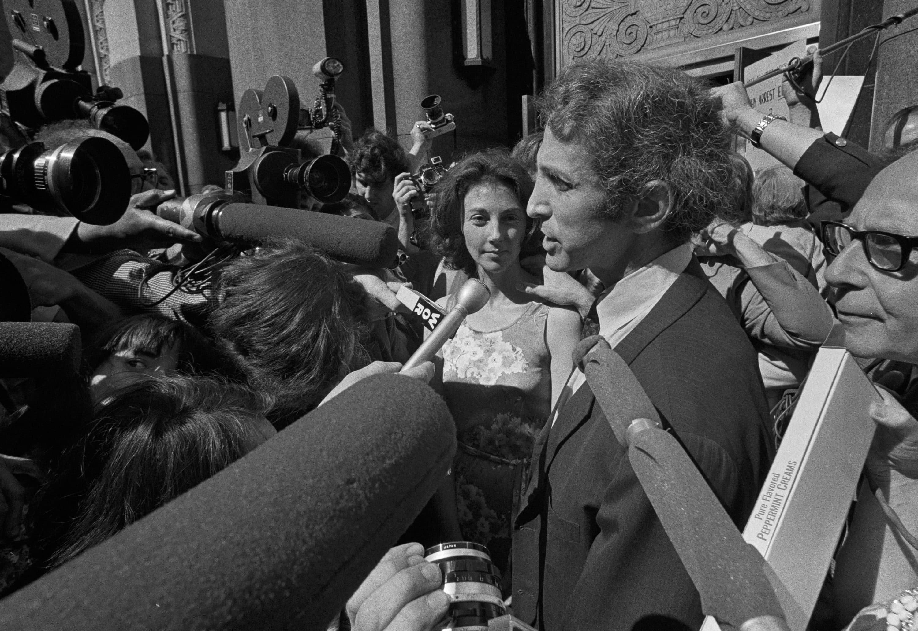 Daniel Ellsberg, with his wife, talks to reporters outside the Boston federal building on June 28, 1971. Ellsberg, charged in federal warrants with unauthorized possession of top secret documents and failure to return them, arrived to surrender himself to the U.S. Attorney. (AP File Photo)