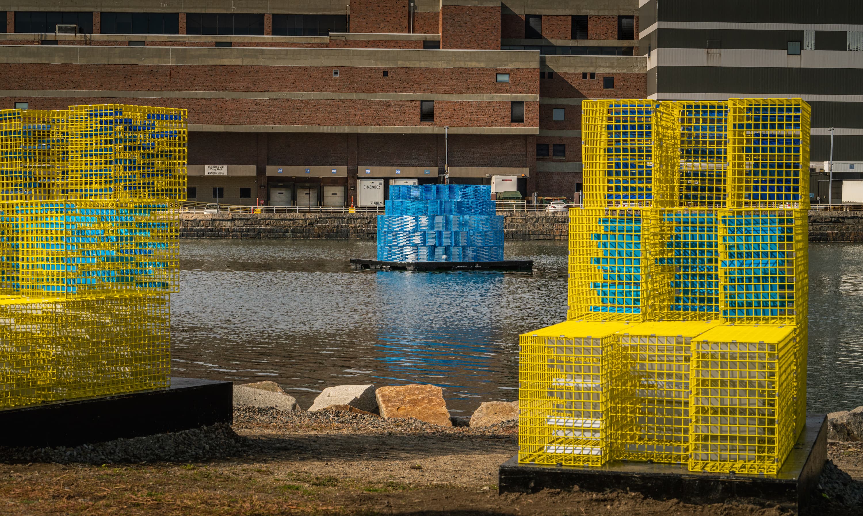 &quot;FutureSHORELINE,&quot; an art installation by Carolina Aragón along Fort Point Channel, imagines how high the water will rise in coming decades. (Courtesy Matt Conti)