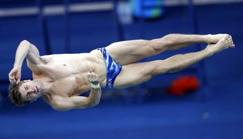 Michael Hixon competes during a men's 3-meter springboard diving preliminary at the 2016 Summer Olympics in Rio de Janeiro, Brazil, in 2016. (Michael Sohn/AP)