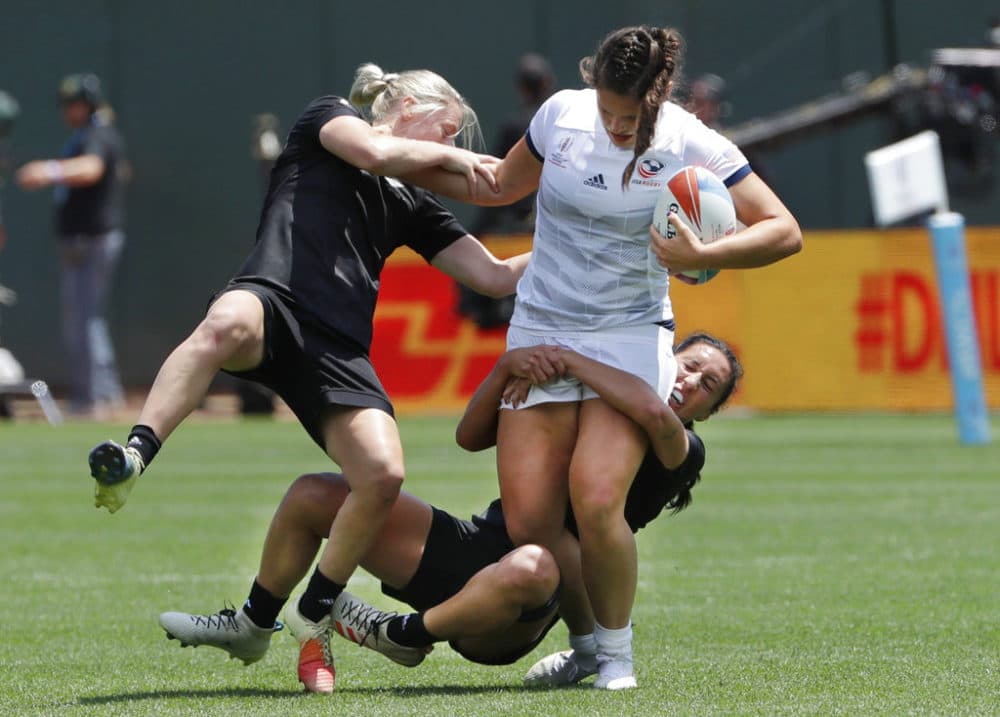 Ilona Maher, top right, runs against players from New Zealand during a Women's Rugby Sevens World Cup semifinal in San Francisco in 2018. (Jeff Chiu/AP)