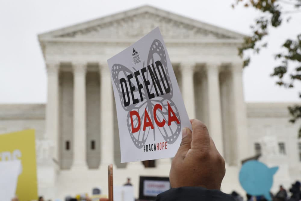 People rally outside the Supreme Court as oral arguments are heard in the case of President Trump's decision to end the Obama-era, Deferred Action for Childhood Arrivals program (DACA), on Nov. 12, 2019. (Jacquelyn Martin/AP/File)