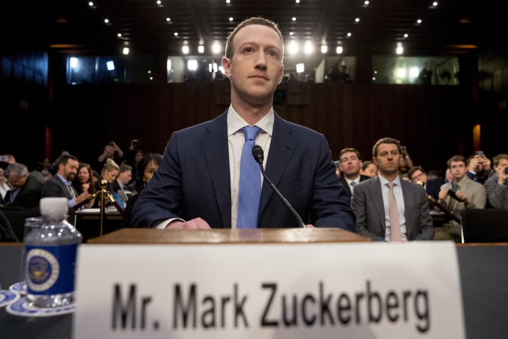 Facebook CEO Mark Zuckerberg arrives to testify before a joint hearing of the Commerce and Judiciary Committees on Capitol Hill in Washington on April 10, 2018. (Andrew Harnik/AP)