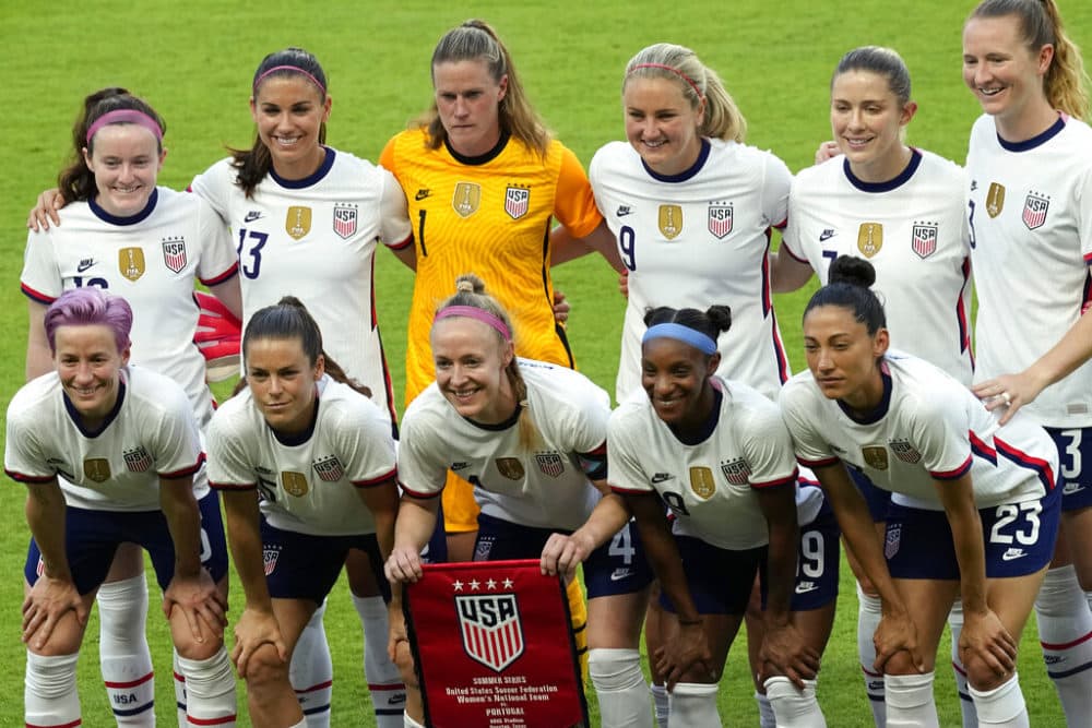 In this Thursday, June 10, 2021 file photo, the United States women's national soccer team starters pose for photographers before an international friendly soccer match against Portugal, in Houston. (David J. Phillip/AP)