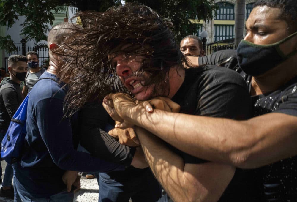 Plainclothes police detain an anti-government protester during a protest in Havana, Cuba, on Sunday, July 11. (Ramon Espinosa/AP)