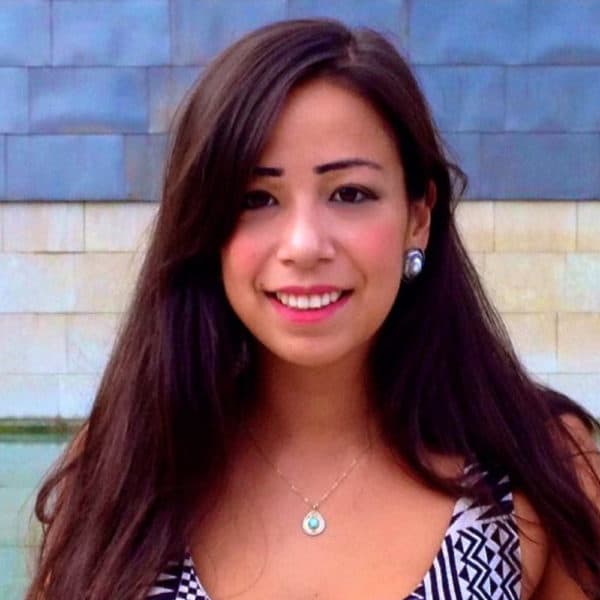 Headshot of Aube Rey Lescure