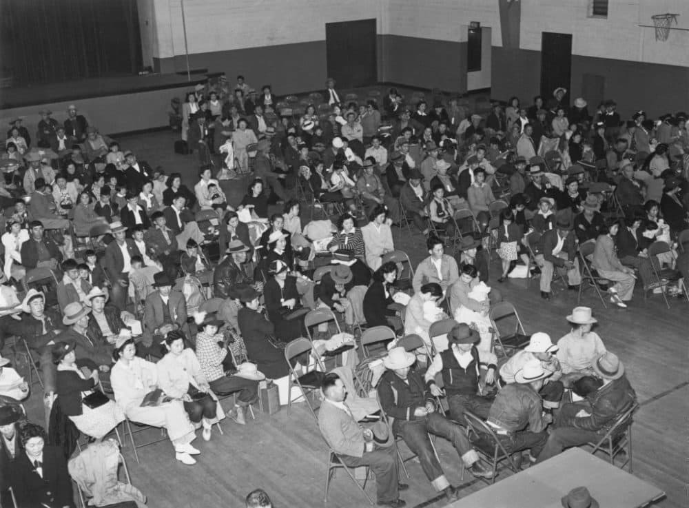 Japanese Americans in Salinas, California, awaiting onward transportation to an internment camp, May 1942. (Russell Lee/Library Of Congress/FPG/Archive Photos/Getty Images)