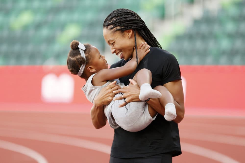 Allyson Felix celebrates with her daughter Camryn after day nine of the 2020 U.S. Olympic Track & Field Team Trials at Hayward Field on June 26, 2021 in Eugene, Oregon. (Steph Chambers/Getty Images)