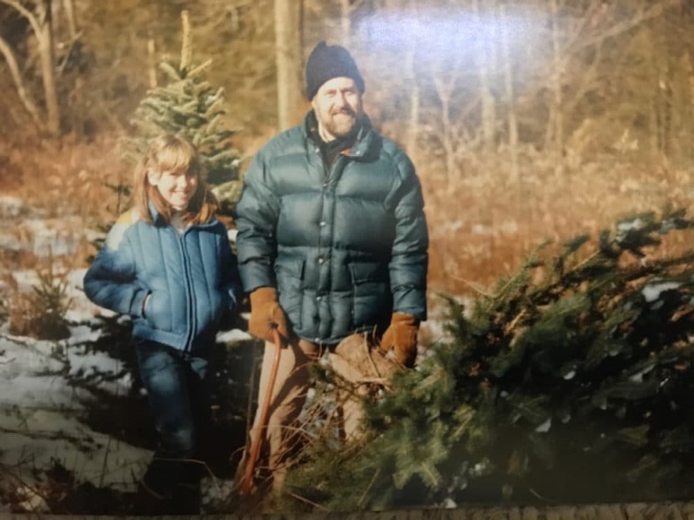 The author and her father cutting down a Christmas tree in 1986. (Courtesy Jane Roper)