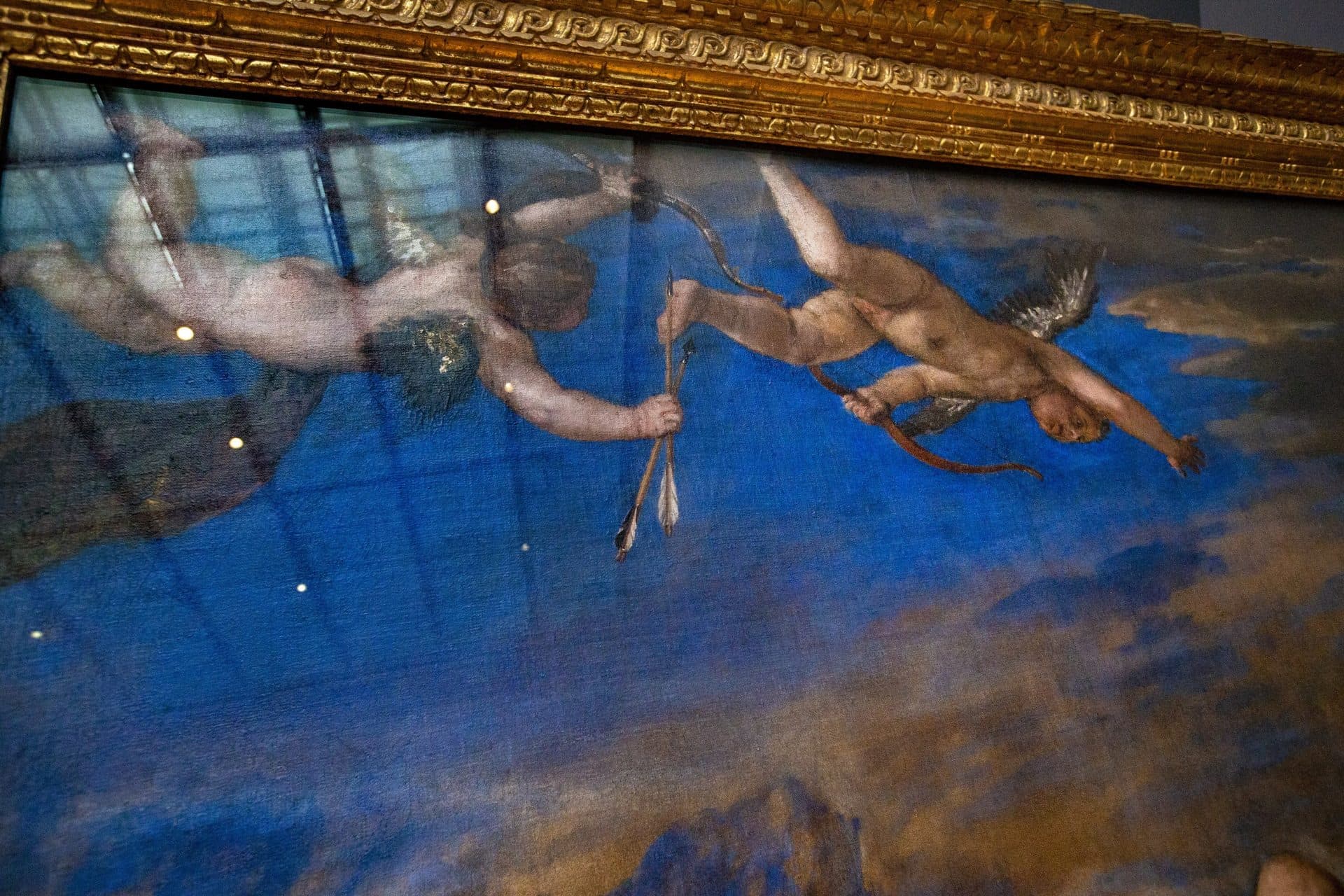 Detail of putti flying above and racing after Europa in Titian’s “The Rape of Europa.” (Jesse Costa/WBUR)