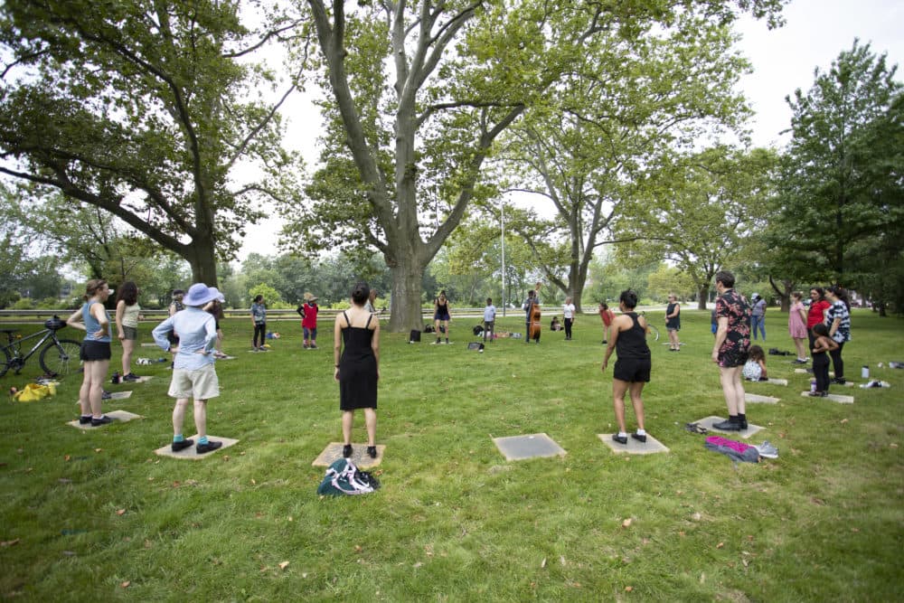 Jenny Herzog teaching a recent Saturday Tap for Joy class in Cambridge's Riverbend Park. (Courtesy Carlos Arzaga)