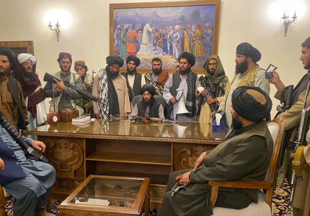 Taliban fighters take control of the Afghan presidential palace. (Zabi Karimi/AP Photo)