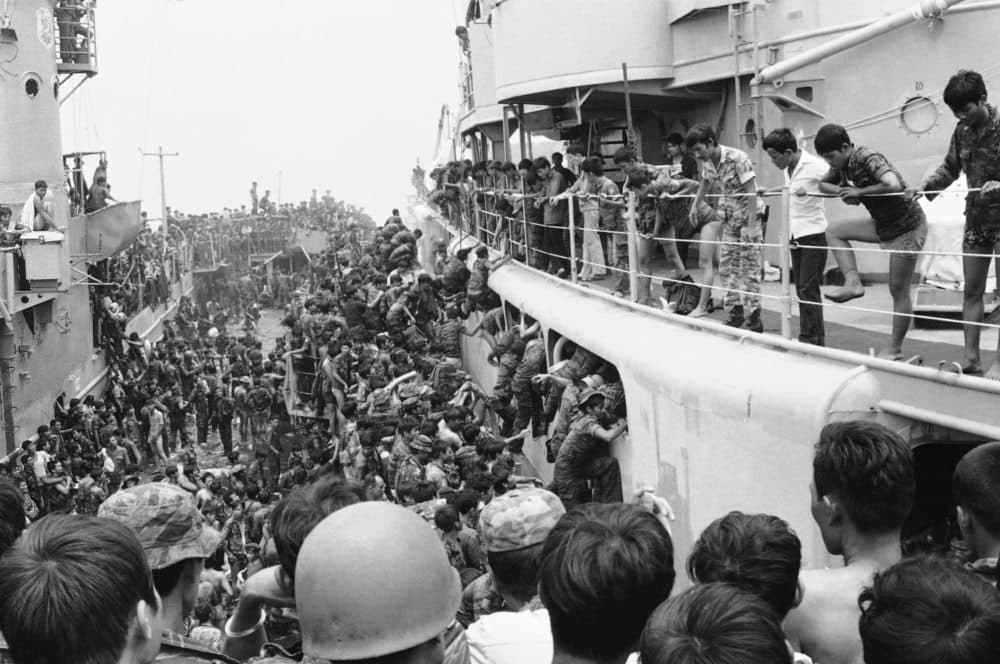 South Vietnamese Marines leap in panic aboard a cutter from an LST in Danang Harbor in Da Nang, Vietnam, on April 1, 1975 as they are evacuated from the city, shortly before its fall to the Viet Cong and North Vietnamese. Cutters in turn hauled them south to Cam Ranh Bay. (AP Photo)