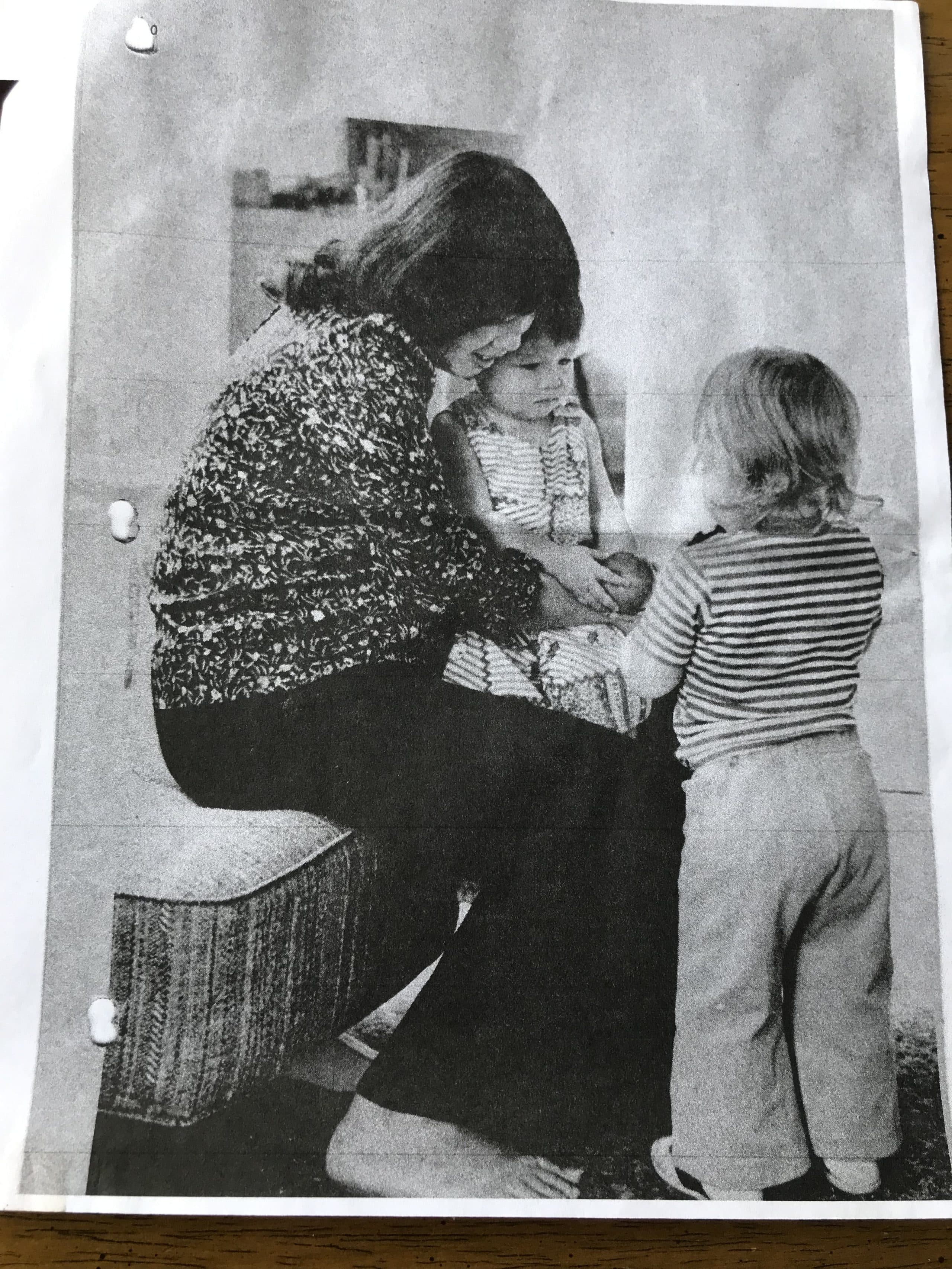 In this archival newspaper clipping, journalist Ngoc Nguyen is pictured with her mother in Michigan, where a sponsor family took them in and helped them start a new life. (Courtesy)
