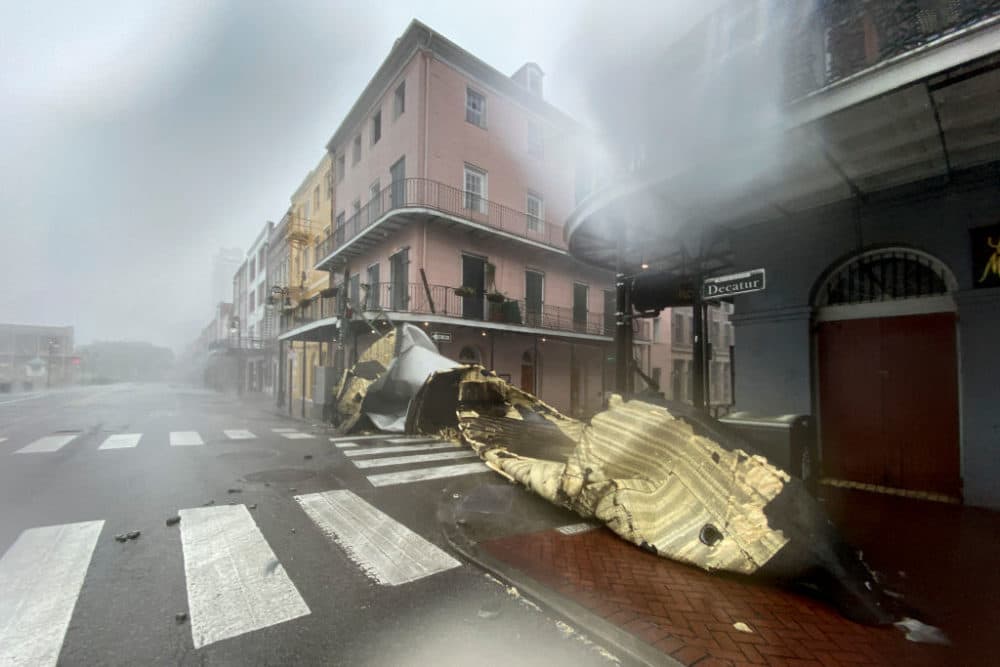 A section of a building's roof is seen after being blown off during rain and winds in the French Quarter of New Orleans, Louisiana, on Aug. 29, 2021 during Hurricane Ida. (Patrick T. Fallon/AFP/Getty Images)