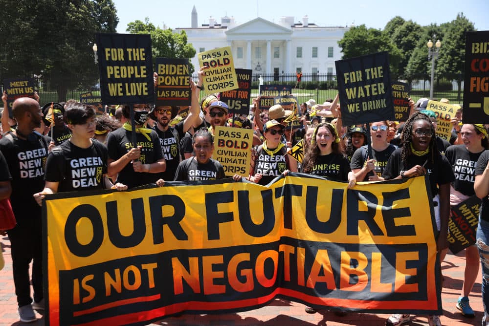 Hundreds of young climate activists  rally in Lafayette Square on the north side of the White House to demand that U.S. President Joe Biden work to make the Green New Deal into law on June 28, 2021 in Washington, DC. Organized by the Sunrise Movement, the 'No Climate, No Deal' marchers demanded a meeting with Biden to insist on an 'infrastructure package that truly invests in job creation and acts to combat the climate crisis.' (Chip Somodevilla/Getty Images)