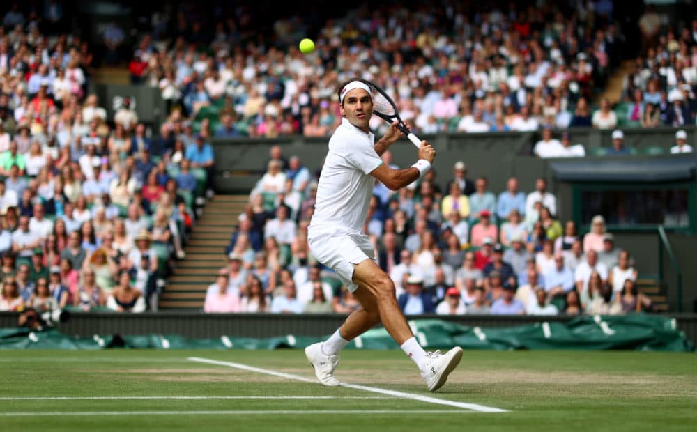 Roger Federer plays a backhand during his men's Singles Quarter Final match against Hubert Hurkacz during The Championships - Wimbledon 2021 at All England Lawn Tennis and Croquet Club on July 7, 2021 in London, England. (Julian Finney/Getty Images)