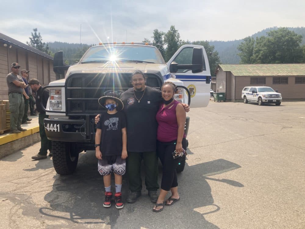 Danny Manning, assistant fire chief for the Greenville Rancheria, with his family in front of a new fire truck. (Courtesy)