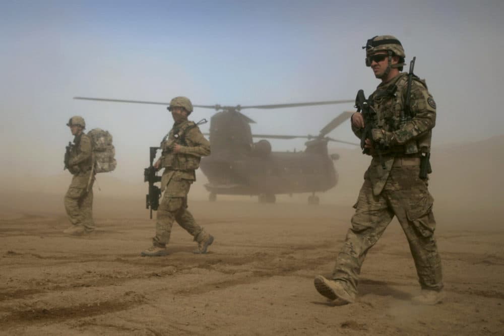 In this Jan. 28, 2012 file photo, U.S. soldiers patrol west of Kabul, Afghanistan. As the U.S. ends the war in Afghanistan and as the Taliban recapture much of the country, Americans are asking if the longest war in their history was worth the cost. (Hoshang Hashimi/AP file photo)