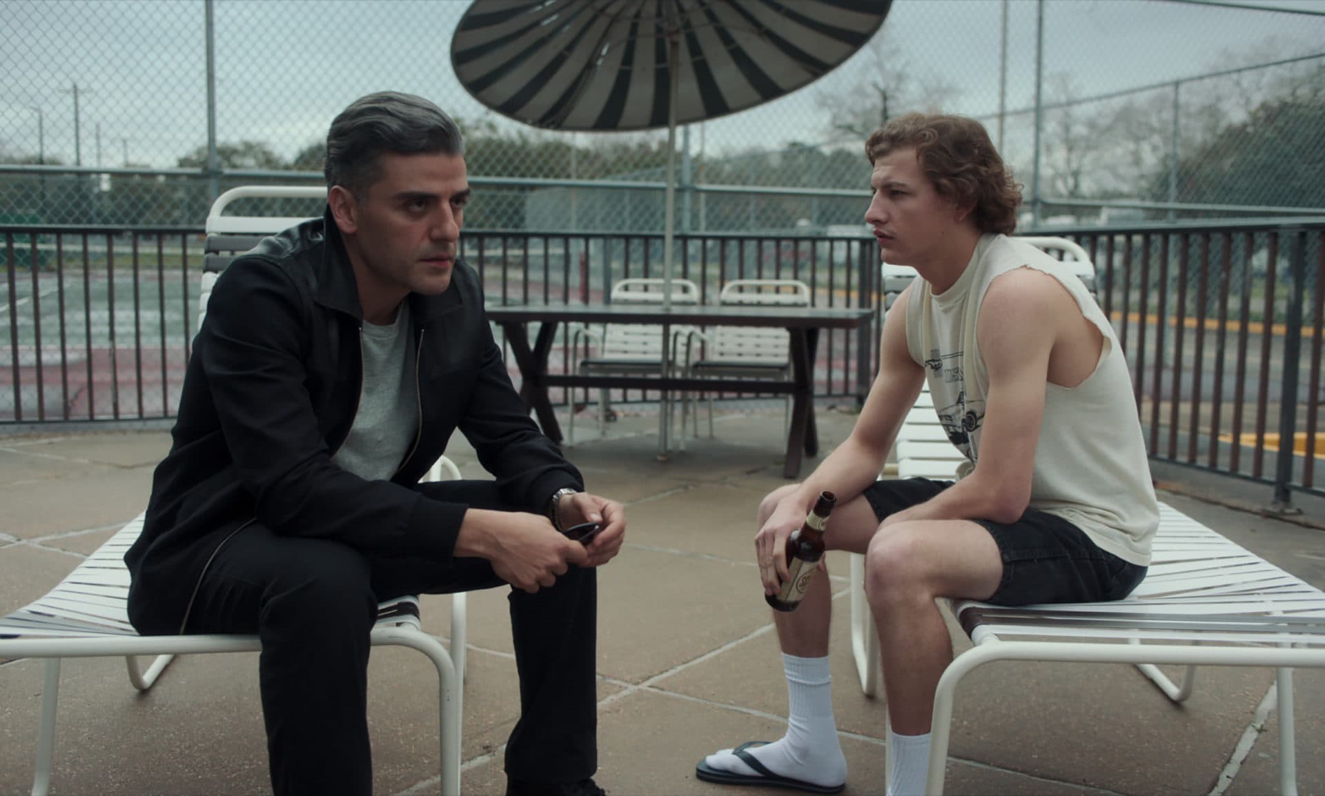 Oscar Isaac as William Tell and Tye Sheridan as Cirk in &quot;The Card Counter.&quot; (Courtesy Focus Features)