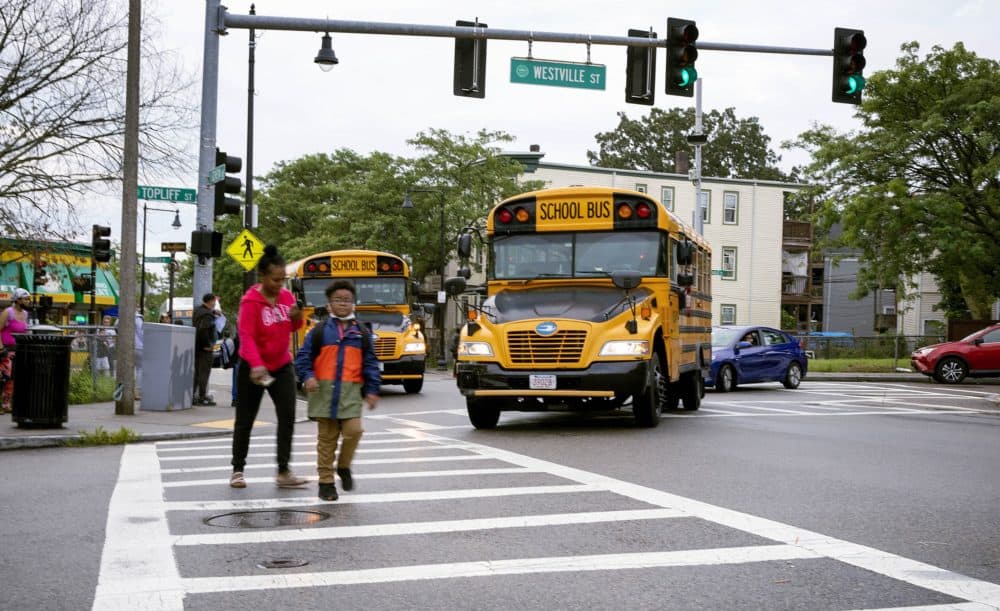 School buses on Geneva Avenue in Dorchester. (Robin Lubbock/WBUR)