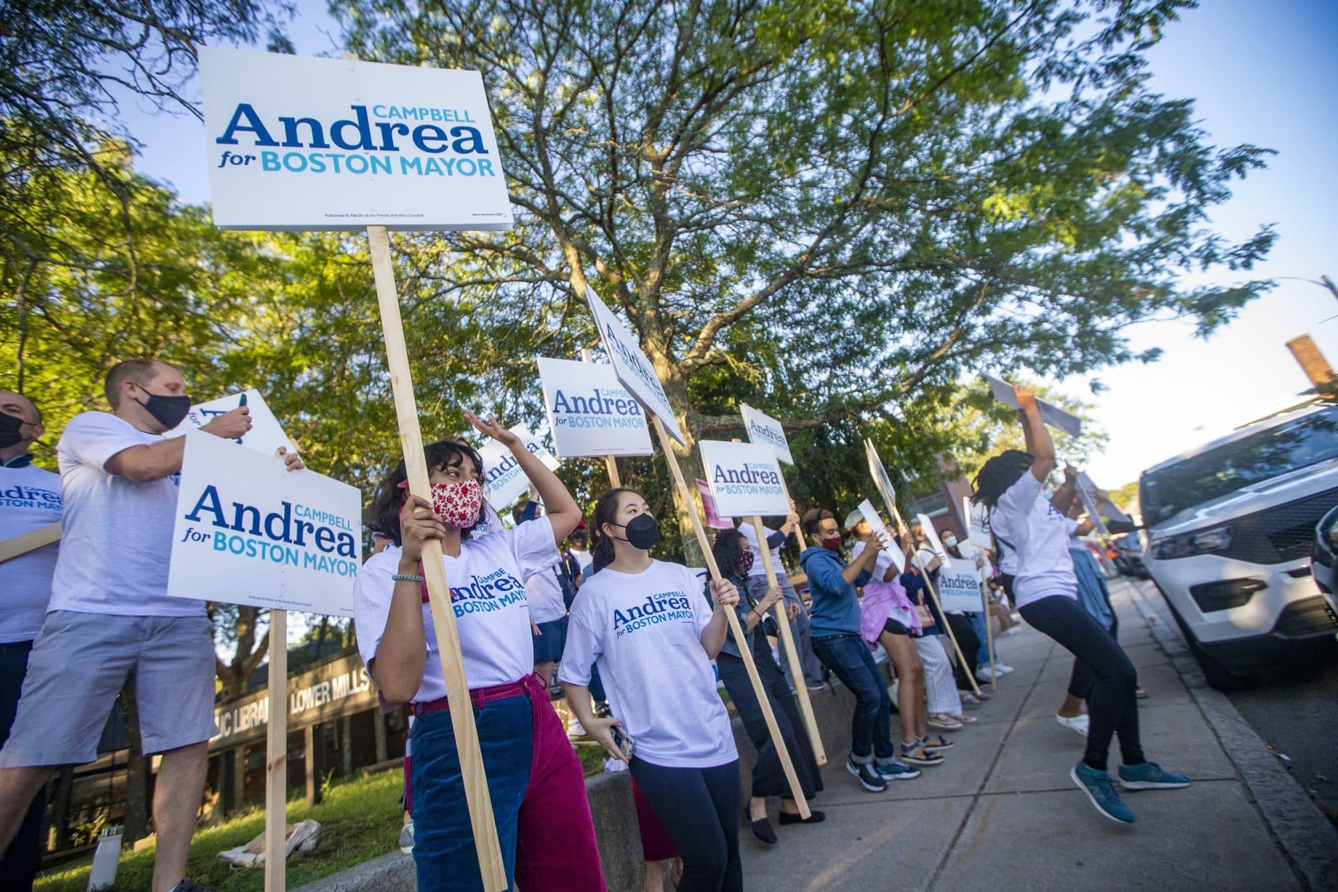 A large crowd of Andrea Campbell supporters outside of the Lower Mills branch of the Boston Public Library on Tuesday morning. (Jesse Costa/WBUR)