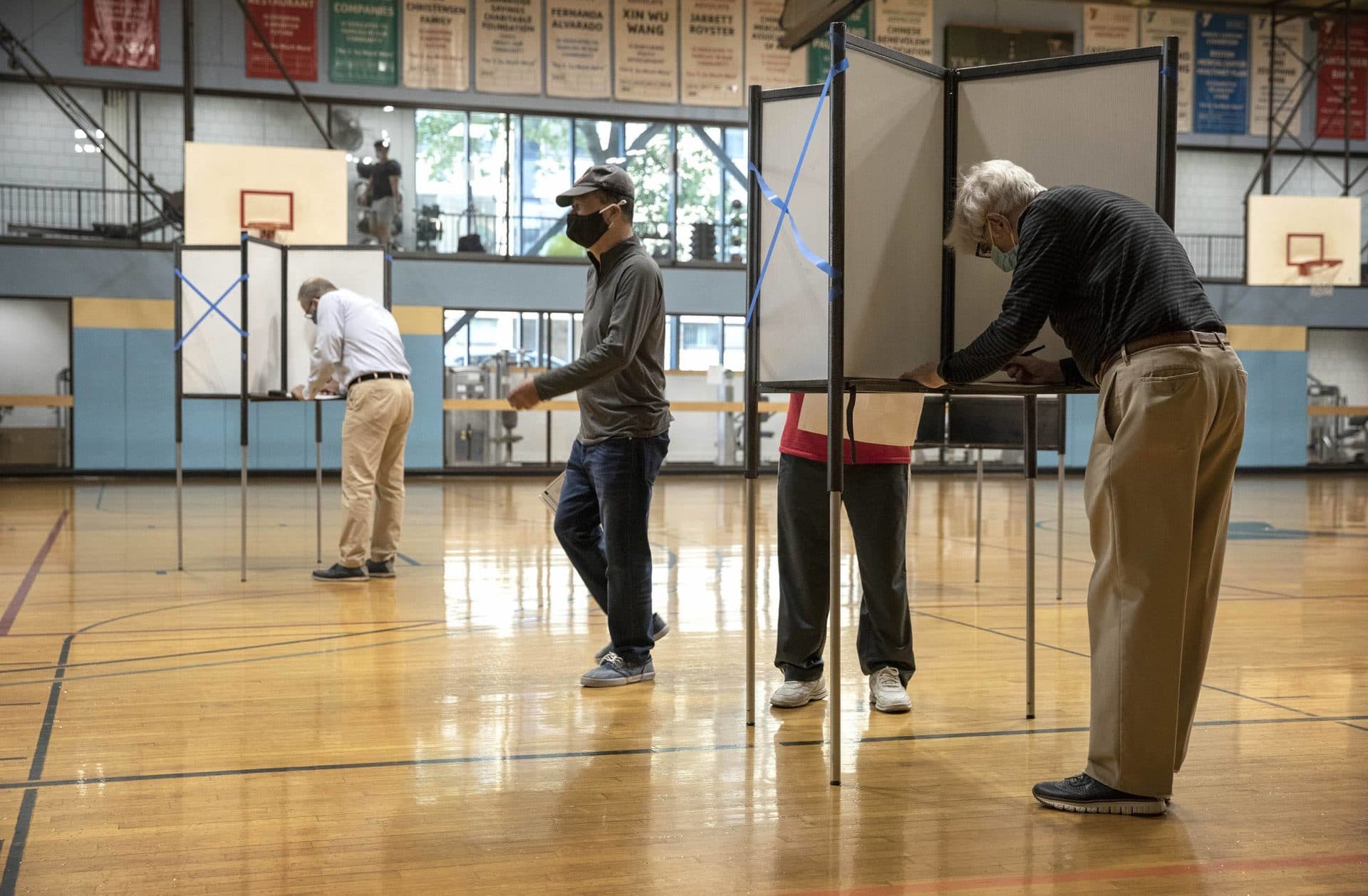 Voting gets underway at the Wang YMCA polling station in Boston. (Robin Lubbock/WBUR)