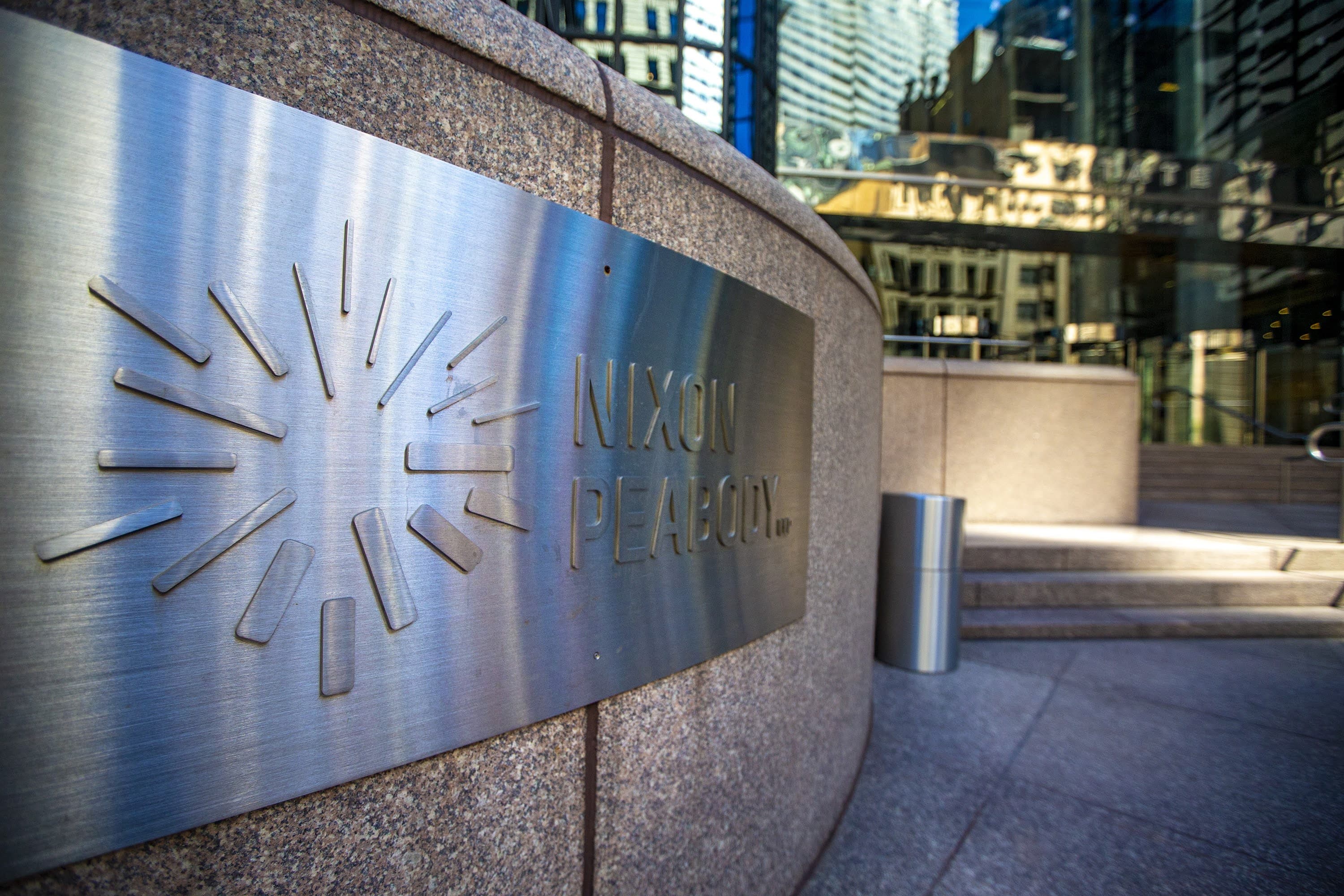 The sign in front of the Nixon Peabody office in Boston. (Jesse Costa/WBUR)