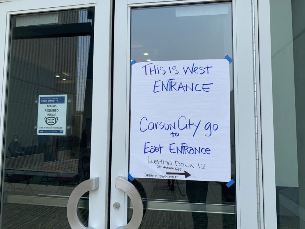 A sign outside the American Red Cross evacuation center at the Reno-Sparks Convention Center in Reno, Nev., for wildfire evacuees relocated from the Carson City sites on Sept. 1, 2021 (Lucia Starbuck/KUNR Public Radio)