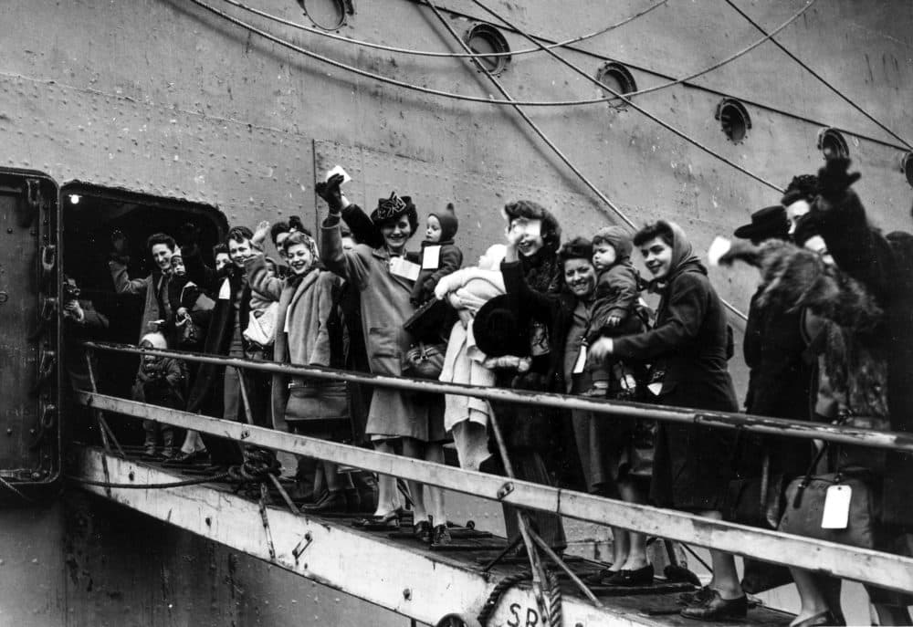 British women known as GI brides going up the gangplank of the S.S. Argentina to start the journey to America and a new life with their American husbands in 1946. (Popperfoto via Getty Images/Getty Images)