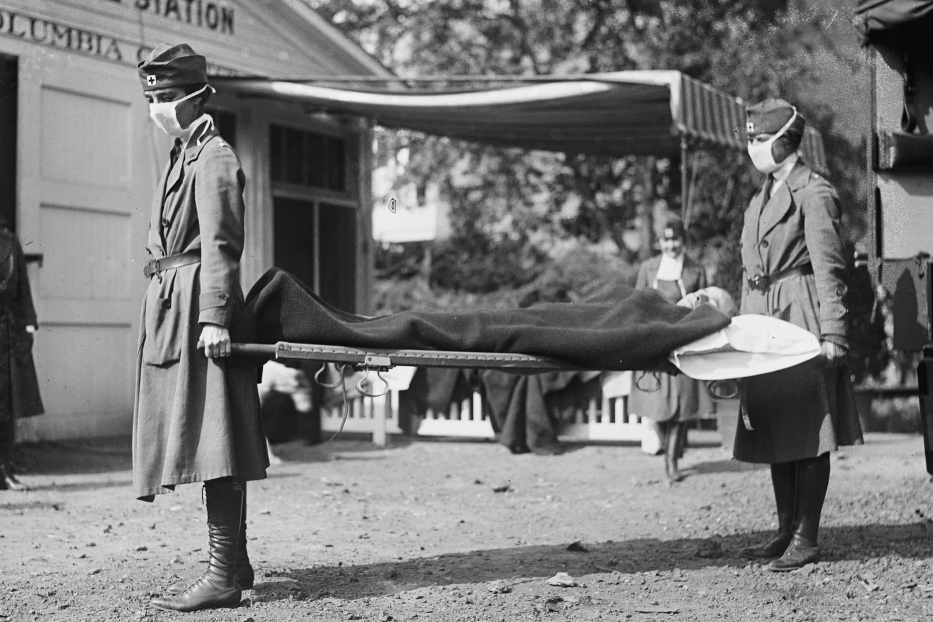 A demonstration at the Red Cross Emergency Ambulance Station in Washington during the influenza pandemic of 1918. (Library of Congress via AP)