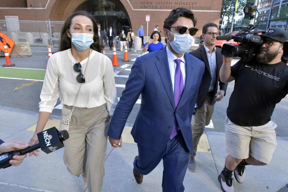 Jasiel Correia and his wife, Jenny Fernandes, leave the John Joseph Moakley United States Courthouse in Boston on Monday. (Josh Reynolds/AP)