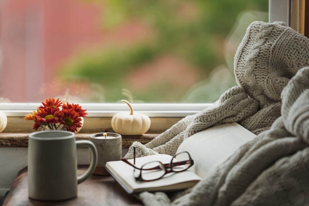 Get cozy with a new book. (Getty Images)