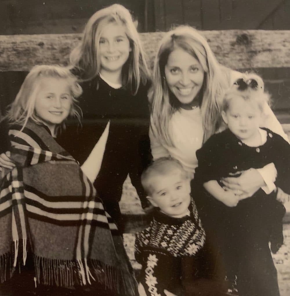 In this 2007 Christmas Card photo, Lindsay and Sophia, left, are pictured with their mom, Dana, and half-siblings Kate and Aidan. (Courtesy Sophia Cook)
