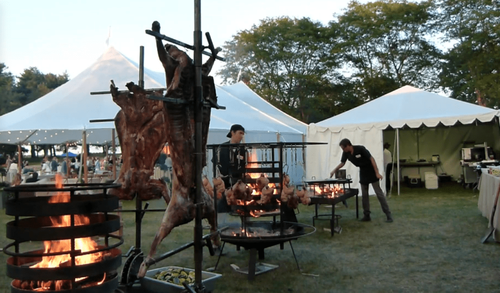 The Hindquarter cooking whole lambs and whole chickens. (Courtesy of The Hindquarter)