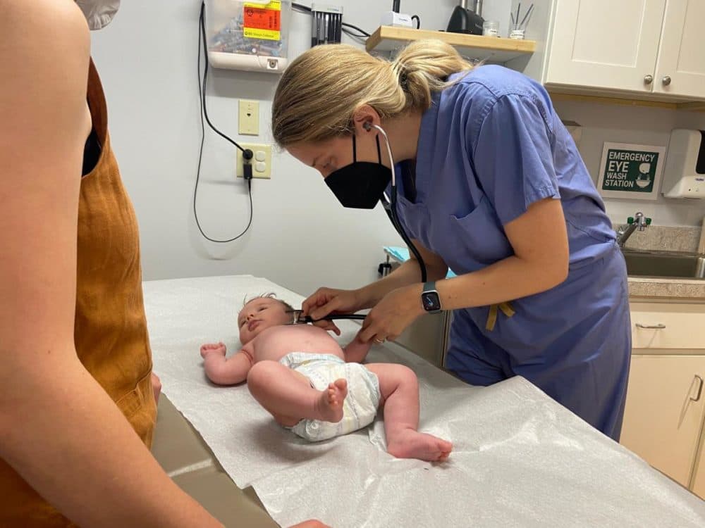 Physician assistant Sarah Vacca with her patient, Summer. (Karen Brown/NEPM)