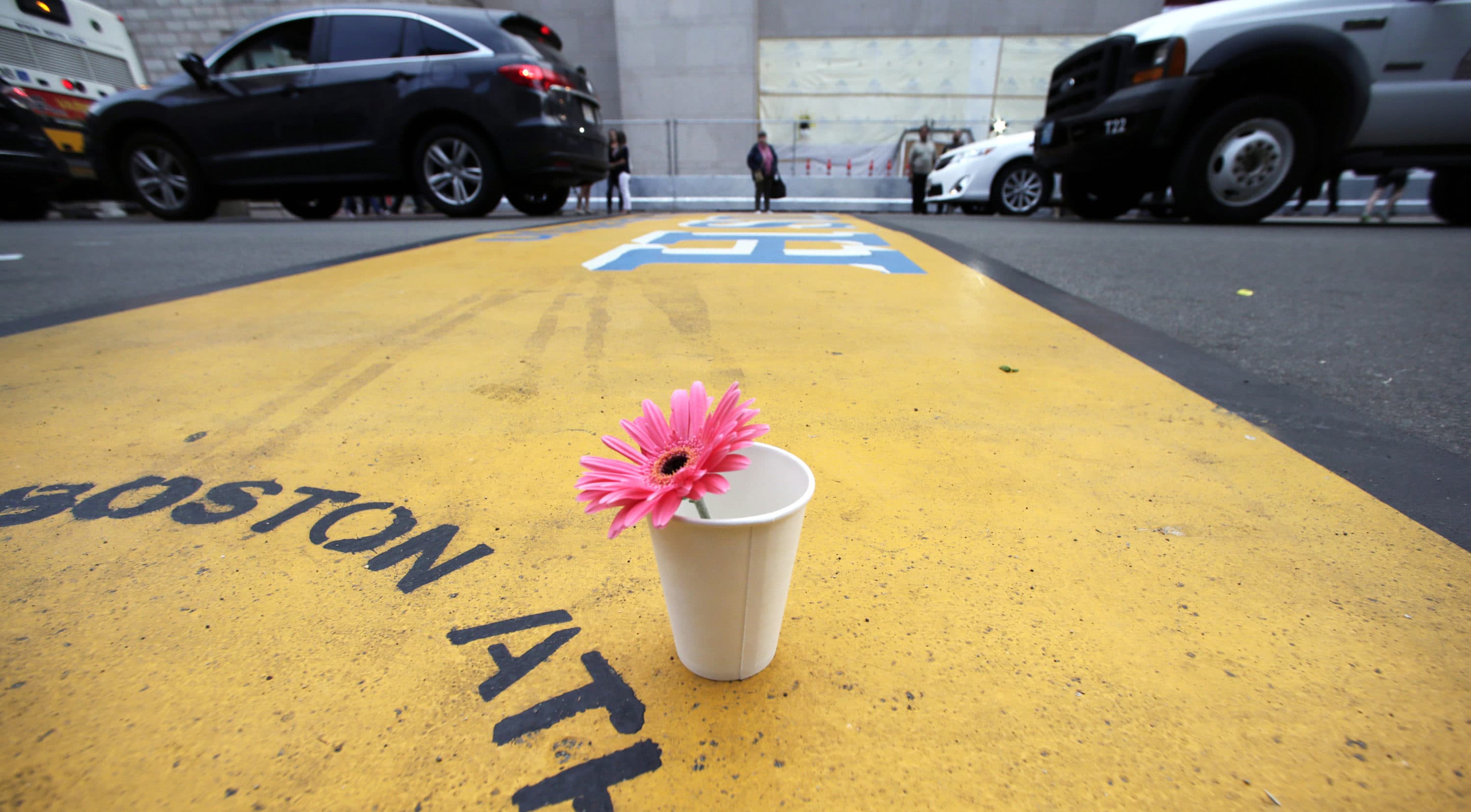 A single flower rested in a paper cup on the finish line of the Boston Marathon after a federal jury ruled that Tsarnaev should be sentenced to death for his role in the 2013 attack. (Charles Krupa/AP)