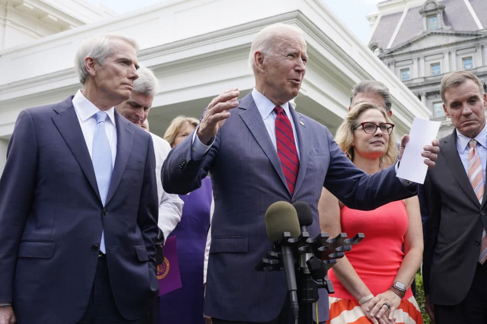 President Joe Biden, with a bipartisan group of senators, speaks Thursday June 24, 2021, outside the White House in Washington. (AP Photo/Jacquelyn Martin)
